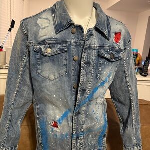 Stylish Blue Denim Jacket with Artistic Accents